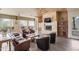 Resident lounge featuring leather seating, a fireplace, a TV, and stylish interior finishes at 11375 E Sahuaro Dr # 2033, Scottsdale, AZ 85259