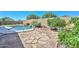 Backyard with desert landscaping, pool and stone tile at 11580 N 86Th Ln, Peoria, AZ 85345