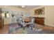 Bright dining room featuring hardwood floors and ample natural light for entertaining and Gathering meals at 11580 N 86Th Ln, Peoria, AZ 85345