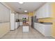 Spacious kitchen with abundant cabinetry, stainless steel appliances, and an island with butcher block countertop at 11580 N 86Th Ln, Peoria, AZ 85345