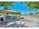 Park featuring a shaded picnic area, playground equipment, and landscaped surroundings, perfect for Gathering outings at 11580 N 86Th Ln, Peoria, AZ 85345