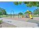 Fun-filled playground with colorful slides, climbing bars, and smooth surfaces, ideal for outdoor activities at 11580 N 86Th Ln, Peoria, AZ 85345