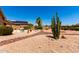 Beautiful desert landscaping with drought tolerant plants, a patio and solar panels at 11631 W Lemon Ct, Surprise, AZ 85378