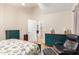 Spacious bedroom with neutral tones, wooden floors, vaulted ceiling, and a walk-in closet at 11631 W Lemon Ct, Surprise, AZ 85378