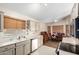 Cozy kitchen featuring light countertops and bright dining area at 11631 W Lemon Ct, Surprise, AZ 85378