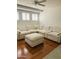 Cozy living room featuring an oversized sectional sofa and ottoman at 1257 E Voltaire Ave, Phoenix, AZ 85022
