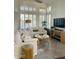 Airy living room featuring abundant natural light and neutral-toned furnishings at 1257 E Voltaire Ave, Phoenix, AZ 85022