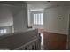 Bright living room with hardwood floors and white walls at 1257 E Voltaire Ave, Phoenix, AZ 85022