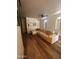 Inviting living room with a large sectional sofa and wood flooring at 1350 S Greenfield Rd # 1221, Mesa, AZ 85206