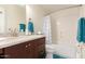 Bright bathroom offers a modern vanity with granite countertops, a shower, and an adjacent tub at 14000 N 94Th St # 2187, Scottsdale, AZ 85260