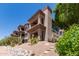 Condo featuring private balconies, desert landscaping, and beautiful architectural details at 14000 N 94Th St # 2187, Scottsdale, AZ 85260