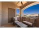Covered outdoor patio offers comfortable seating and lovely neighborhood views at 14000 N 94Th St # 2187, Scottsdale, AZ 85260