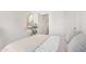 A calming bedroom showcases a serene retreat, complete with an ironing board setup at 15006 N 172Nd Ln, Surprise, AZ 85388