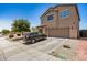 This two-story home has a two-car garage and a neutral color scheme, located in a tranquil neighborhood at 15006 N 172Nd Ln, Surprise, AZ 85388