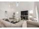 Spacious living area features high ceilings, neutral colors, and sleek decor at 15006 N 172Nd Ln, Surprise, AZ 85388