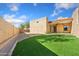 Backyard with artificial turf and patio perfect for entertaining at 16648 N 30Th Ave, Phoenix, AZ 85053
