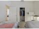 Bedroom with large closet and access to bathroom at 20234 N Mariposa Way, Surprise, AZ 85374
