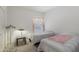 Clean guest bedroom featuring carpet and a large window at 20234 N Mariposa Way, Surprise, AZ 85374