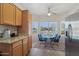 Cozy breakfast nook with lots of windows, a ceiling fan, and stainless steel appliances at 20234 N Mariposa Way, Surprise, AZ 85374