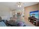 Spacious living room featuring tile floors, an open layout, and seamless flow to other areas at 20234 N Mariposa Way, Surprise, AZ 85374