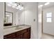 Bathroom with a large mirror over a vanity with updated fixtures at 2650 W Union Hills Dr # 215, Phoenix, AZ 85027