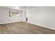 Bright, unfurnished bedroom with a single window and wood-look flooring at 2650 W Union Hills Dr # 215, Phoenix, AZ 85027