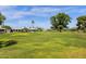 Relax in the community's green space, a serene expanse with mature trees at 2650 W Union Hills Dr # 215, Phoenix, AZ 85027