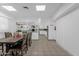 Eat in kitchen with view to dining area, white cabinets, and plenty of sunlight at 2650 W Union Hills Dr # 215, Phoenix, AZ 85027