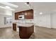 Kitchen with white walls, modern appliances and view into living room at 2650 W Union Hills Dr # 215, Phoenix, AZ 85027