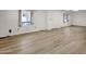 Spacious living room boasts wood floors and natural light from the large windows at 2650 W Union Hills Dr # 215, Phoenix, AZ 85027