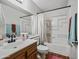 Bathroom showing vanity, mirror, tub/shower combo, with updated fixtures and decor at 2929 E Broadway Rd # 50, Mesa, AZ 85204