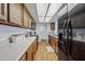 Modern kitchen with wood cabinets, stainless steel appliances, and lots of counter space at 2929 E Broadway Rd # 50, Mesa, AZ 85204
