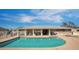 Community pool under a bright blue sky at 2929 E Broadway Rd # 50, Mesa, AZ 85204