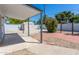 Backyard view featuring a shed, patio cover, and ample space for outdoor activities at 3325 S Shafer Dr, Tempe, AZ 85282