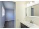 Bathroom with a sink and access to another room at 3325 S Shafer Dr, Tempe, AZ 85282