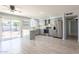 Modern kitchen featuring stainless steel appliances, ample counter space, and sliding glass doors to a patio at 3325 S Shafer Dr, Tempe, AZ 85282