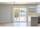 Bright living area featuring a sliding glass door and access to the outdoor patio area at 3325 S Shafer Dr, Tempe, AZ 85282