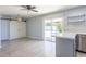 Inviting living room with sliding glass doors and a barn door accent, flowing to the backyard at 3325 S Shafer Dr, Tempe, AZ 85282