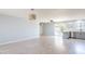 Bright living room with sleek flooring, updated fixtures and a seamless open-concept design at 3325 S Shafer Dr, Tempe, AZ 85282