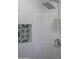 Modern shower with sleek tile, niche, and stylish fixtures at 3325 S Shafer Dr, Tempe, AZ 85282