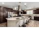Gorgeous kitchen with granite countertops, stainless steel appliances, and a breakfast bar at 3338 E Coconino Dr, Gilbert, AZ 85298