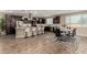 Open-concept kitchen features a breakfast bar, stainless steel appliances, and a formal dining area at 3338 E Coconino Dr, Gilbert, AZ 85298