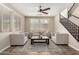 Cozy living room with comfortable seating, hardwood floors and neutral tones at 3338 E Coconino Dr, Gilbert, AZ 85298