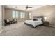 Spacious main bedroom with carpet and large windows at 3338 E Coconino Dr, Gilbert, AZ 85298