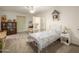 Bedroom with carpet flooring, ceiling fan, full size bed, and an assortment of decor at 3515 E Kings Ave, Phoenix, AZ 85032