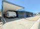 Exterior with a RV, golf cart, blue painted exterior, large parking pad, and covered carport at 3515 E Kings Ave, Phoenix, AZ 85032