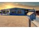 Charming home featuring a covered front porch and a decorative mailbox, nestled on a gravel lot at 3515 E Kings Ave, Phoenix, AZ 85032