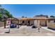 Residential property featuring an outdoor patio with seating, brick pavers, and a covered pergola for relaxing outdoor living at 3515 E Kings Ave, Phoenix, AZ 85032