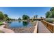 Beautiful pond with a water feature, surrounded by walking paths and lush landscaping at 3515 E Kings Ave, Phoenix, AZ 85032
