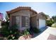 Charming single-story home with a well-maintained lawn and desert landscaping in front at 4527 E Amberwood Dr, Phoenix, AZ 85048